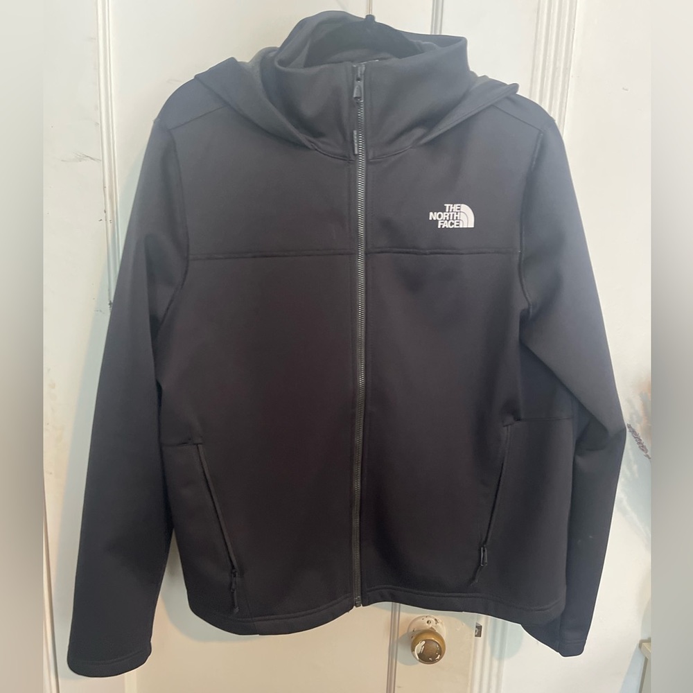 Women’s black hooded Northface jacket. Fleece lined XL. Brand new.